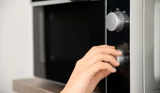 Hand and microwave